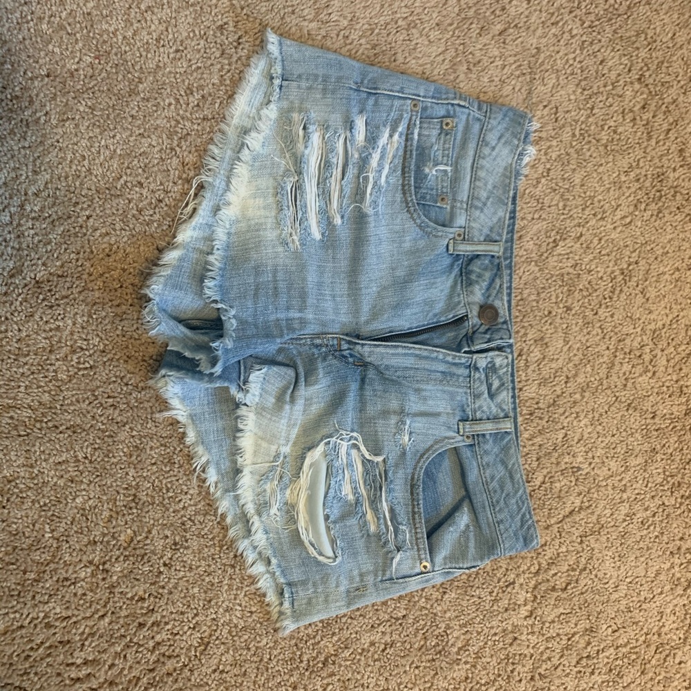 High rise ripped American eagle shorts